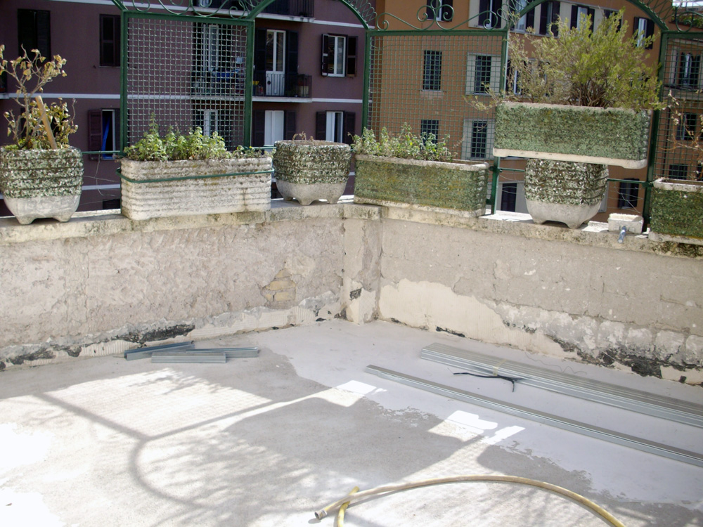 Ripristino di terrazza ammalorata e fornitura  e posa in opera di pavimentazione.